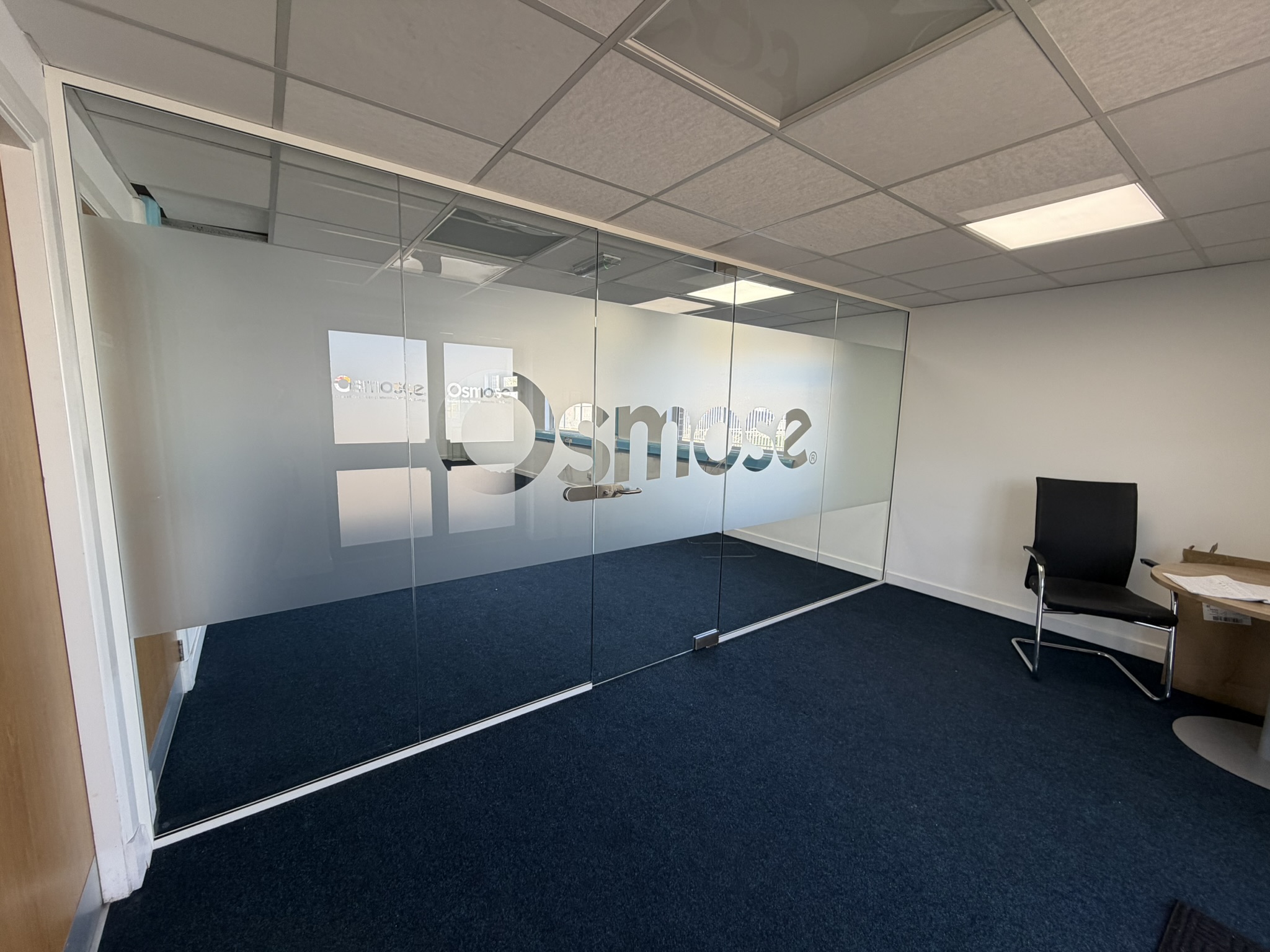 Sleek Space Division: Office Glass Partitioning & Branding in Morley