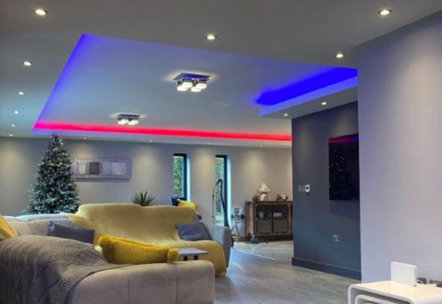 Bespoke ceiling bulkheads with colour-changing LED lighting JWL Interiors
