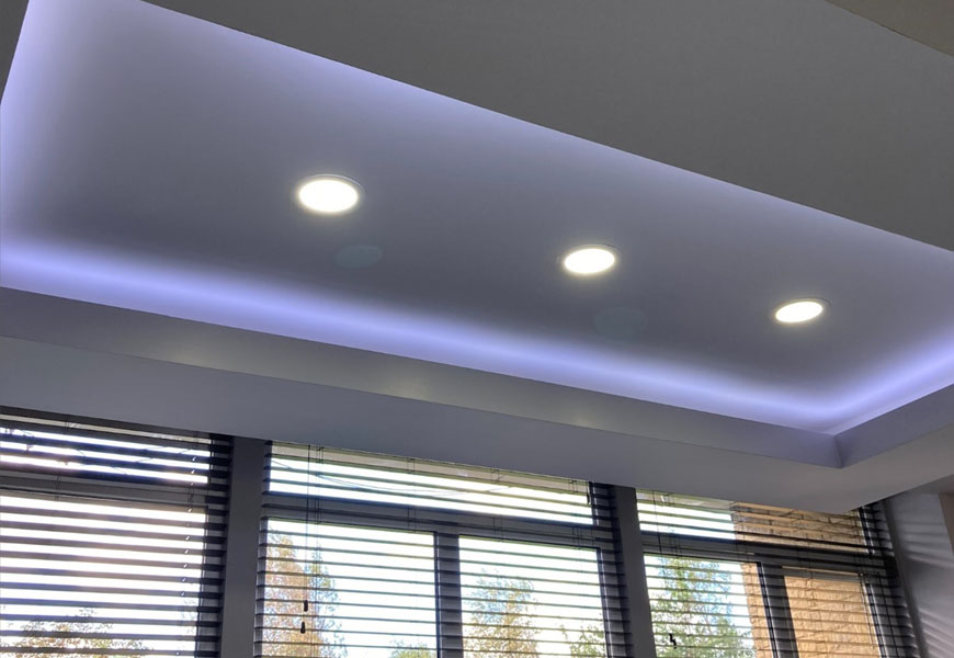 Bespoke illuminated reception bulkhead at Batley High School JWL Interiors
